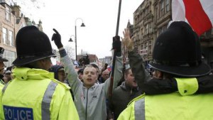 A man gestures during a demonstration by supporters of the Pegida movement in Newcastle, northern England