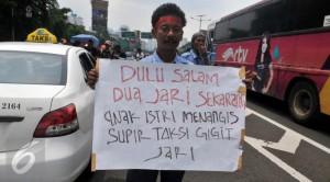 052737700_1458637045-20160322--Ribuan-Supir-Taksi-Serbu-Gedung-MPR-DPR-Jakarta--Johan-Tallo-06