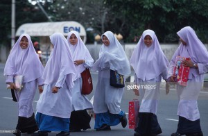 wearing-a-traditional-hijab-headscarves-a-group-of-young-schoolgirls-picture-id175062107