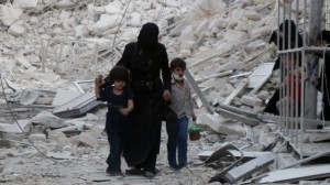 wanita dan anak di reruntuhan aleppo